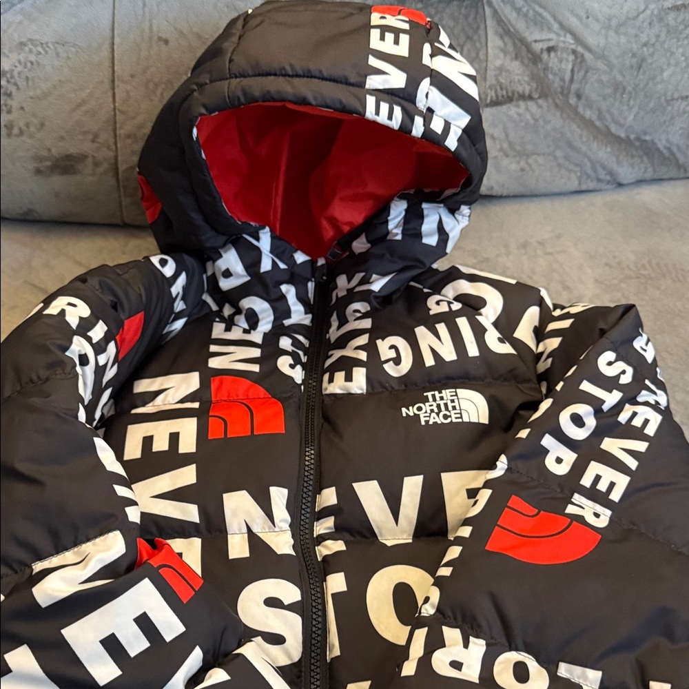 Boy like new The North Face Black Jacket with Red Accents